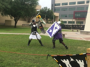 Two SCA members engage in heavy combat.